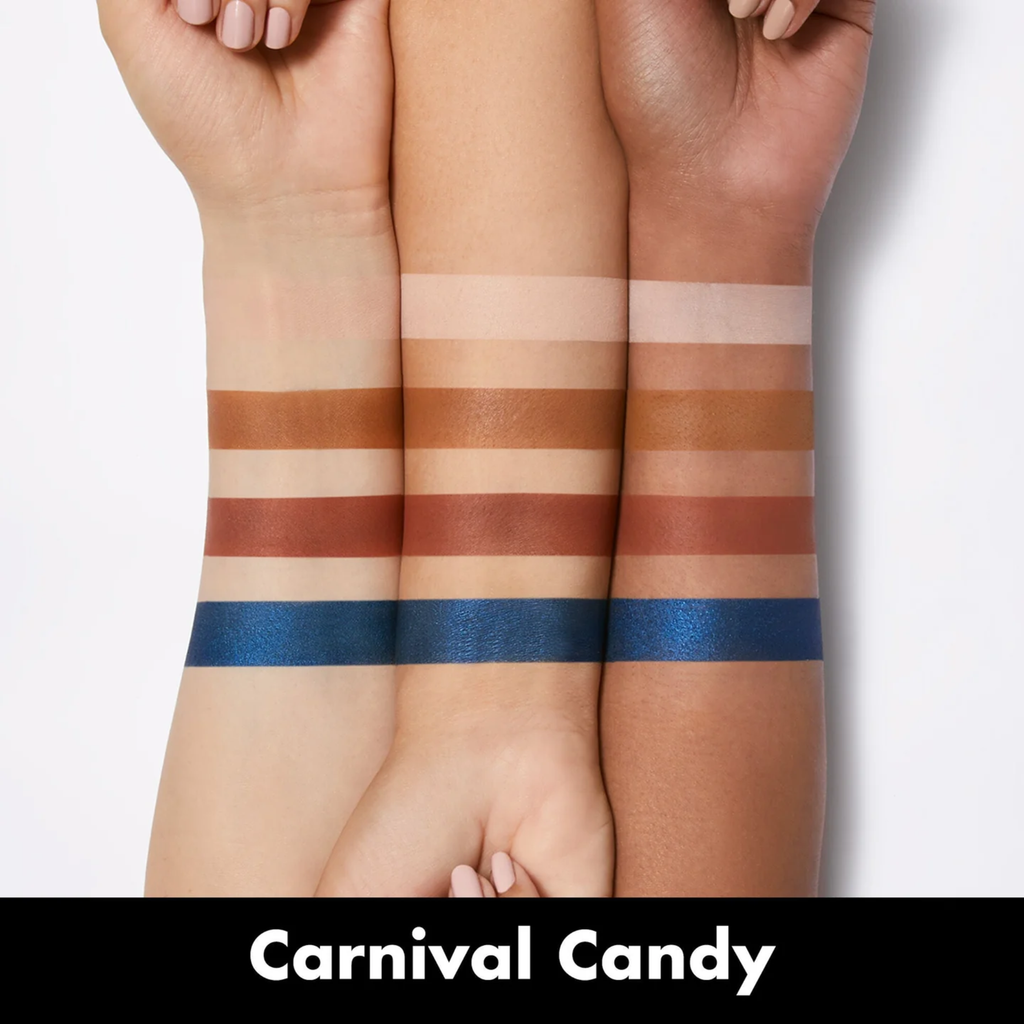 Swatches van Carnival Candy oogschaduw op de arm.