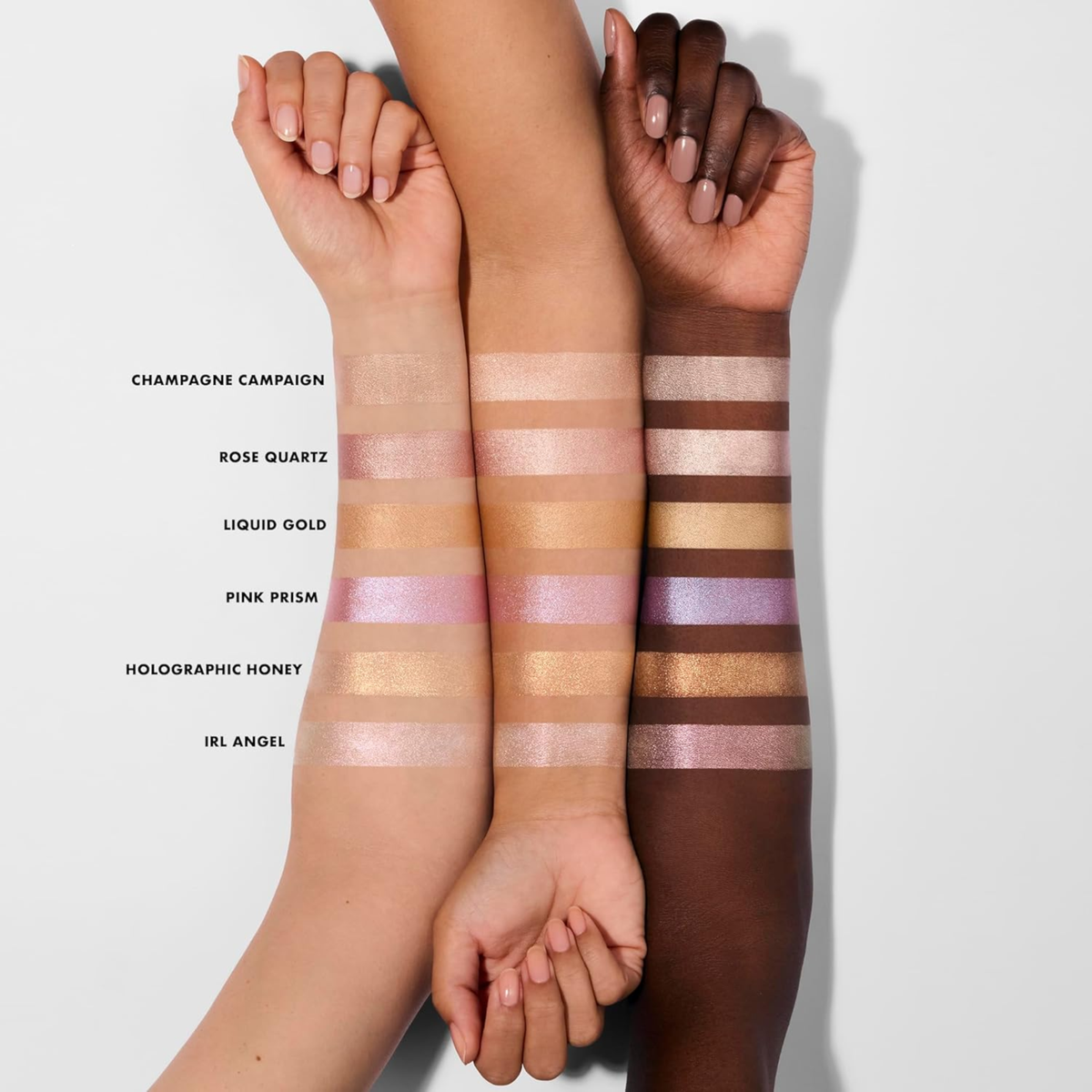 Swatches van e.l.f. Halo Glow Beauty Wand Highlighter op verschillende huidtinten.